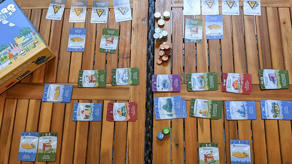 A typical Machi Koro playfield.